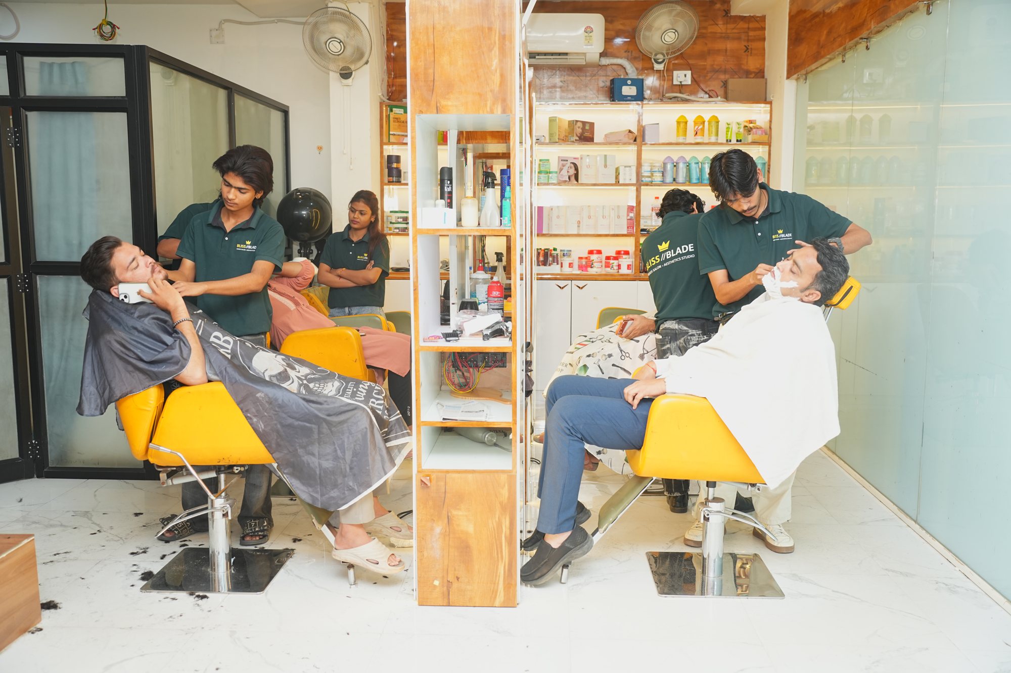 Stylist giving a client a haircut